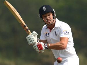 Nick Compton in action facing a delivery in his England cricket whites and full protection