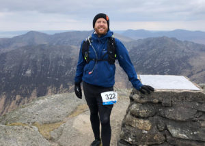 Chris at a checkpoint, high up a mountain in Wales