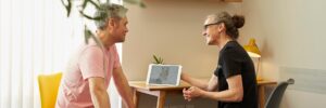 practitioner having a friendly consultation with a patient